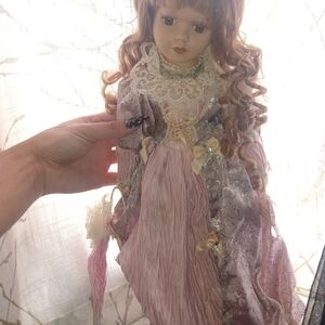 Elegant Pink and Purple Porcelain Doll